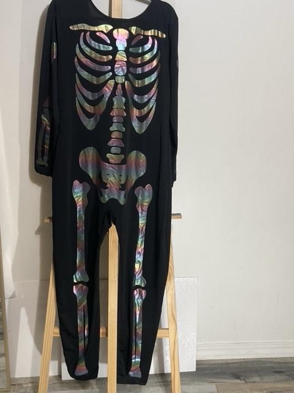 Women’s Black Halloween costume Onesie with Iridescent Skeleton Accent
